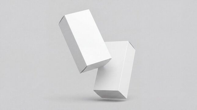 Two White Rectangular Boxes Suspended Mid- Air on Gray white boxes packaging