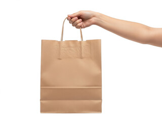 Hand holding brown paper bag isolated on transparent background