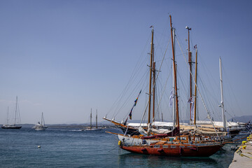 Fototapeta premium Old wooden sailing boats in the harbour, Spetses, Greek Islands