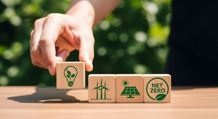 Hand Placing Lightbulb Block on Eco Icons and Net Zero Goal