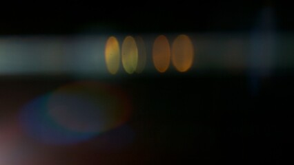 Fototapeta premium Real Lens Flare Reflections for Overlay or Transition Isolated on Black Background