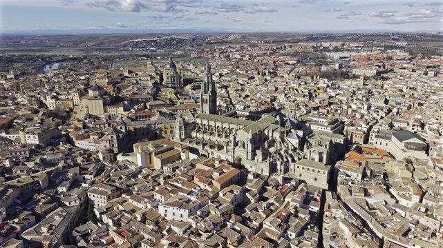 The Primatial Metropolitan Cathedral of Saint Mary of the Assumption in Toledo, Spain. Aerial HDR 4K drone video of Toledo Cathedral in old city.