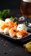 Appetizing seafood plate with salmon, shrimp, and mozzarella, complemented by lemon slices and beer on dark surface