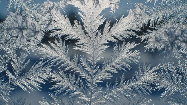 Dirty windowpane obscuring bright winter landscape view