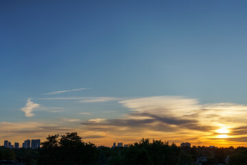 Fototapeta premium Sunrise sky and city in silhouette, Scarborough, Canada