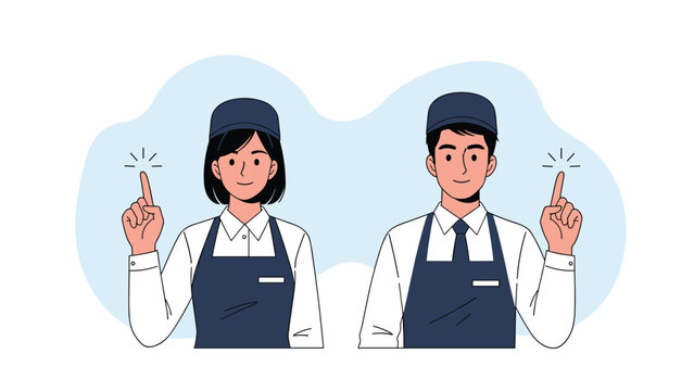 Friendly male and female staff members wearing aprons and caps pointing up with a lightbulb moment or inspiration gesture.