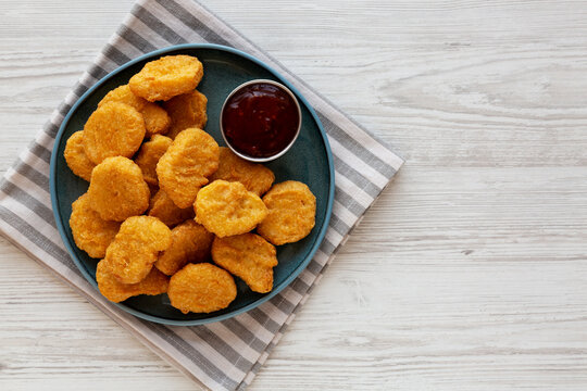 Chicken Nuggets with Sweet Chili Sauce on a Plate, top view. Copy space.