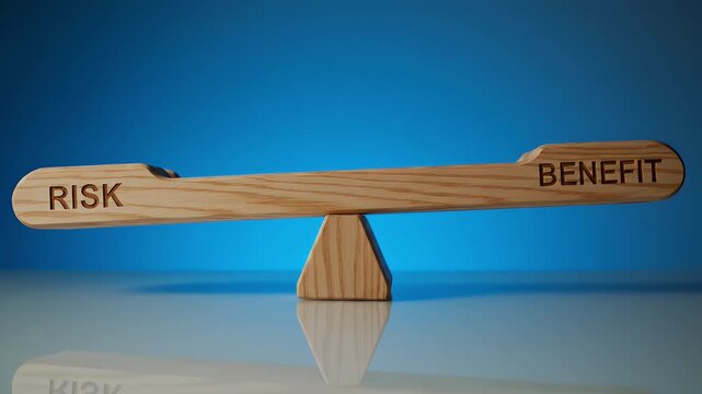 A hand adjusts a wooden seesaw with "RISK" and "BENEFIT" engraved on it, demonstrating the act of balancing choices against a blue background.