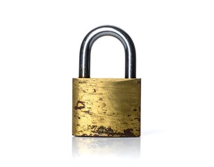 A close-up studio shot presents an upright, well-worn metal padlock isolated on a stark white backdrop