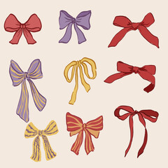 Fototapeta premium Vector set of red, yellow and violet bows. Hand-drawn gift ribbons isolated on white background. Holiday illustration for design, print, fabric or background.