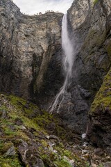 Obraz premium view of the scenic Vettisfossen waterfall in the Utladalen Valley of central Norway