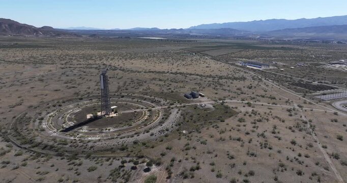 Drone view of Solar Almeria PSA solar tower and heliostat mirrors with concentrated solar power research facility in Tabernas Spain