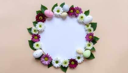 A circular arrangement of dark red, light purple, and white flowers with green leaves surrounds a light blue circle shape for Easter wreath made of colorful spring flowers