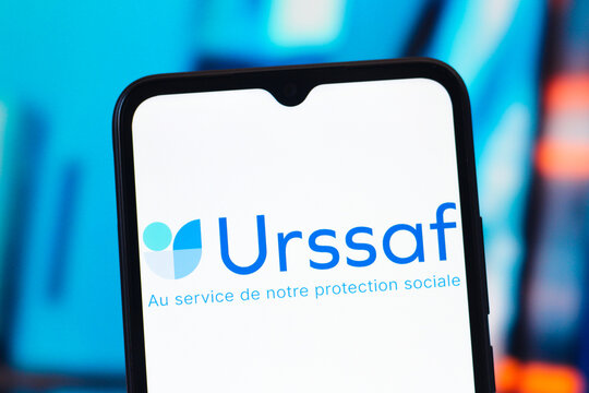 In this photo illustration, the Urssaf (Organizations for the Collection of Social Security and Family Benefit Contributions) logo is seen displayed on a smartphone screen.
