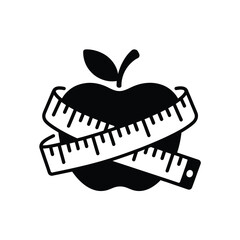 Apple with a measuring tape wrapped around it symbolizing health