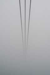 Cablecar Wires Vanishing into Fog