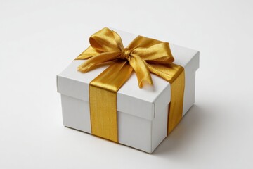Obraz premium White gift box with golden ribbon bow on clean background