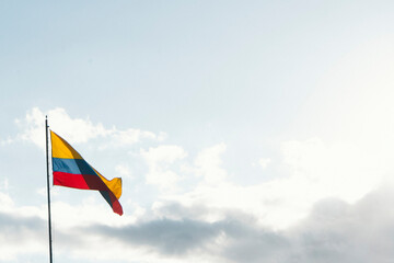 Colombian flag on a textured background. Design solutions concept.