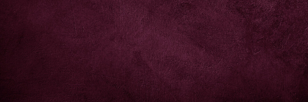 Black dark purple burgundy red wine texture background. Painted concrete wall surface. Grunge rough uneven plaster scratched damaged. Close-up. Empty blank template design ad. Wide banner. Panoramic.