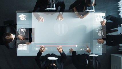 A modern business team collaborates in a virtual learning session, utilizing a digital interface that enhances communication and creativity in the conference room. Raster