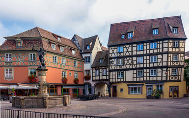 Fototapeta premium France, Alsace, picturesque houses at a square in Ribeauvillé.