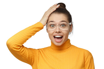 Casual dressed young female in yellow sweater shouting oh my god with open mouth, surprised by low...