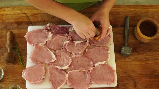 Meat marinade and seasoning process at the kitchen
