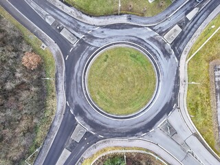 Aerial Top View of Empty Roundabout and Road Intersection