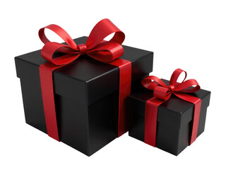 Obraz premium Two small black boxes tied with red ribbons, possibly gifts or decorations