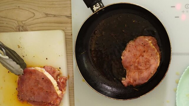 The process of cooking meat in a pan