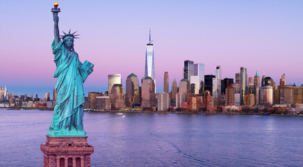 New York downtown district with Liberty Statue. New York panorama with the Liberty Statue. NYC panoramic cityscape and Statue of Liberty. © Volodymyr