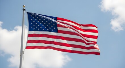 American flag waving in the wind on a clear day