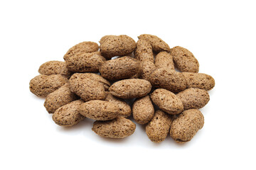 Pile of chocolate pillows isolated on white background. Dry crispy dessert