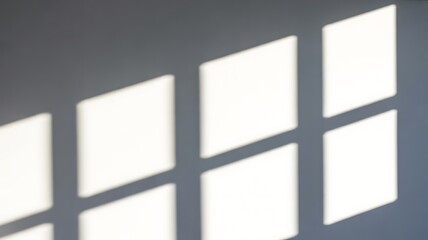 Fototapeta premium Sunny Window Shadows on White Wall â€“ Bright Minimalist Light Pattern