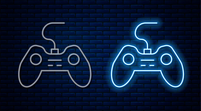 Glowing neon line Gamepad icon isolated on brick wall background. Game controller. Vector