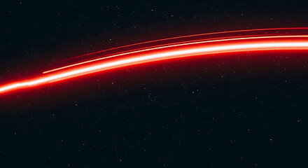 Vibrant red light trail against starry night sky