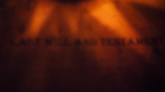 Last Will and Testament: Dramatic Wall Text in Orange Lighting for Legal or Mystery Mood