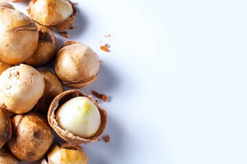 A bunch of nuts with one nut open