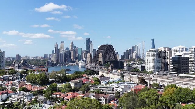 Zoom in to Sydney Harbour bridge Bradfield highway over Harbour to Sydney CBD.
