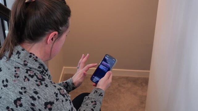 Woman Receives Suspicious SMS Text Message Stating Past Due State Toll Road Fees Looks Like Common Cyber Scam Focused on Urgent Legal Action Concept