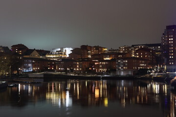 Obraz premium Sweden. Embankment on the river Motala stream in the city of Norrkoping. City of Norrkoping. Night city for New Year. Province of Östergötland. 