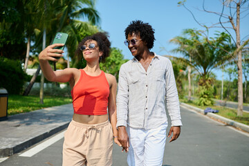 Portrait of youth young people taking selfie near the beach during vacation, enjoying summer and...