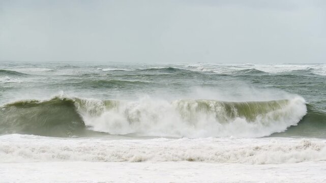 Big Atlantic Ocean Breaking Swell Waves during Storm. Carcavelos, Portugal. Slow Motion