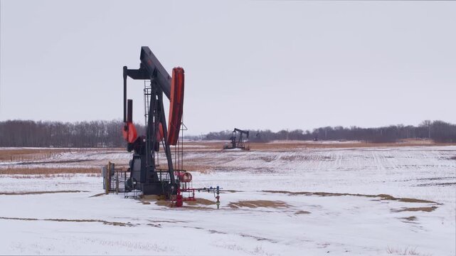 Pumpjacks operating in Saskatchewan Canada winter