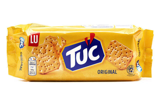 TUC Original crackers by LU in yellow packaging, crispy baked snack biscuits, savory crackers pack isolated on white background, studio product photography for retail and advertising use.