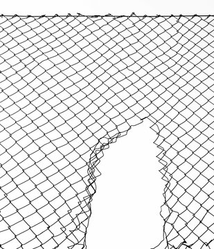 Opening in metallic fence against a blue sky with white clouds. Challenge. uncertainty. breakthrough concept. metaphor. Chain-link, wire netting, wire-mesh, cyclone hurricane fence