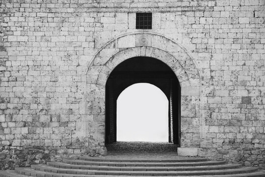 NIS, SERBIA empty arch doorway at the entrance to the Fortress of Ni&scaron; on the banks of the Ni&scaron;ava River. Gate with stairs stairway steps Mock up