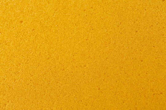 Yellow sponge foam texture background