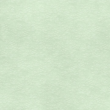 Soft pastel green embossed ornamental texture with swirling patterns. Elegant seamless background perfect for stationery, wallpapers, and subtle luxury designs.