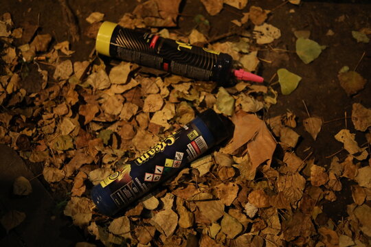 Paris, France - December 18, 2025. Two Nitrous oxide balloons on the street by night. 